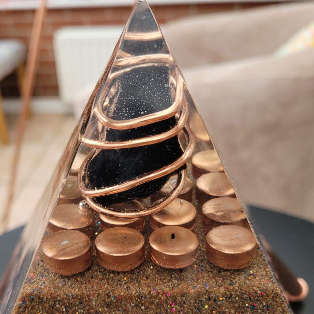 CRYSTAL in orgonite pyramid